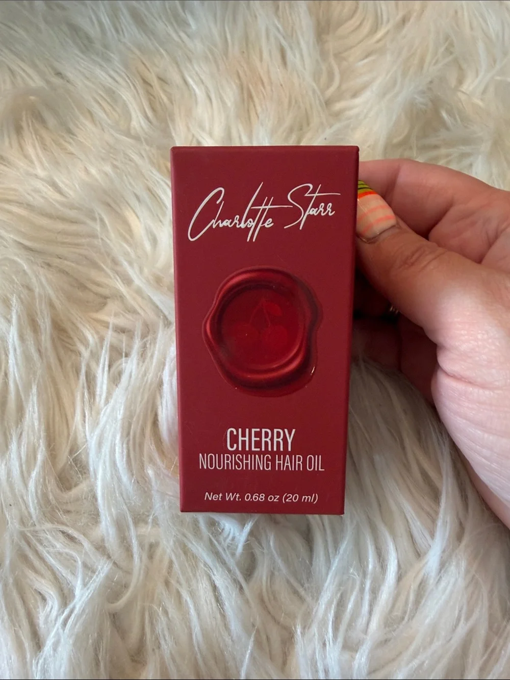 Charlotte Tilbury Cherry Nourishing Hair Oil - red packaging
